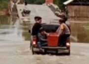 Aksi Kemanusian. Polsek BTS Ulu Bantu Evakuasi Jenazah Akibat Jalan Mura–Pali Tergenang Banjir