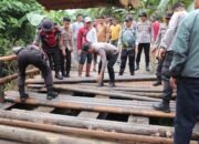 Sukseskan Program BELIDA, Polres Musi Rawas Perbaiki Jembatan Sungai Use
